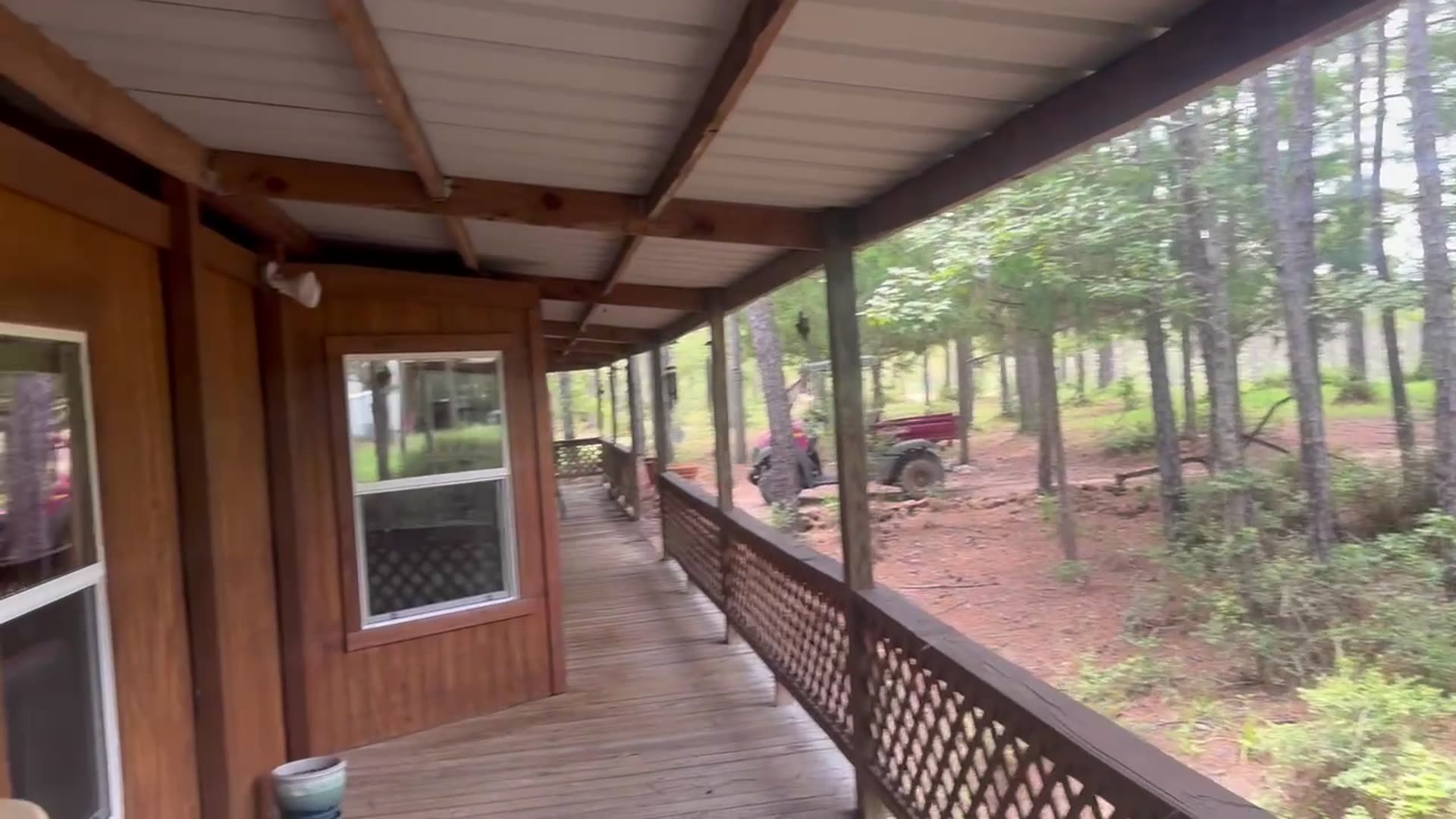 Long covered porch running the length of the ranch house